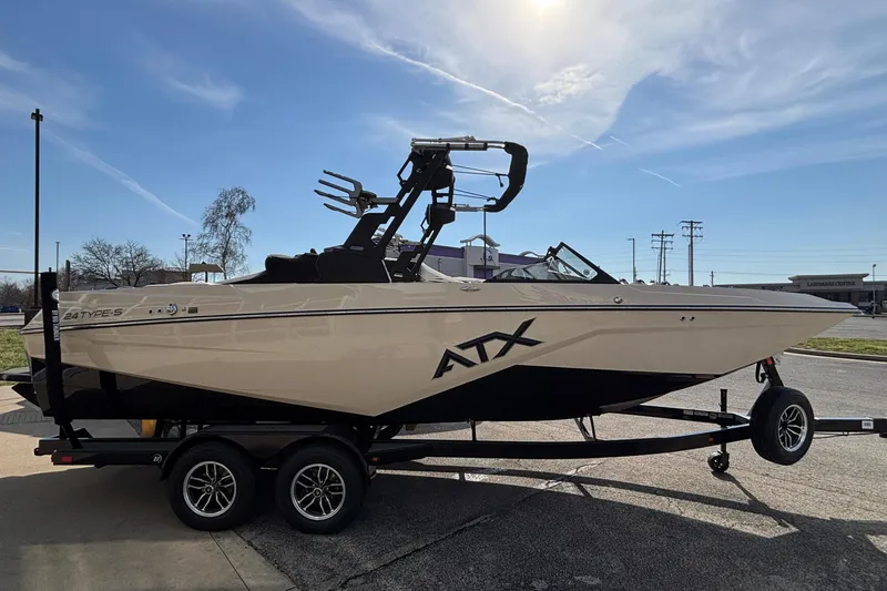 Slide: The Image of 2026 ATX Surf Boats 24 Type-S on trailer under clear sky. - 7