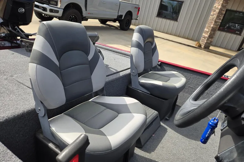 Slide: The Image of 2022 Tracker Bass Tracker Classic XL boat interior with two gray seats. - 6