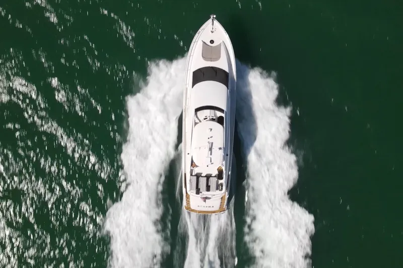 Slide: The Image of Aerial view of 2006 Lazzara 68 Motoryacht cruising on open water. - 5
