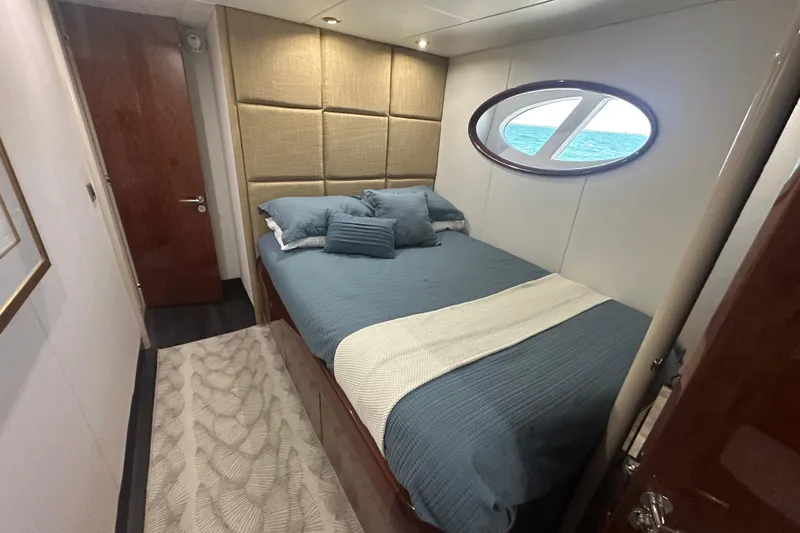 Slide: The Image of Luxurious bedroom in 2006 Lazzara 68 Motoryacht with ocean view window. - 53