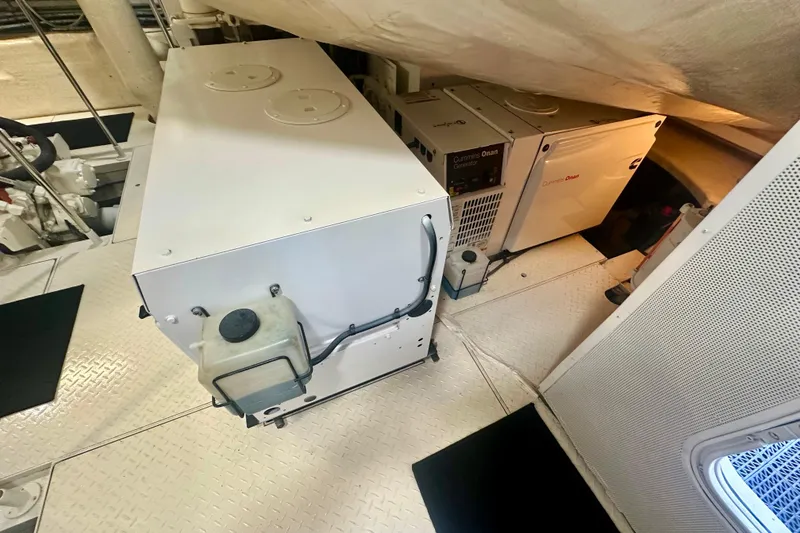 Slide: The Image of Engine room of 2006 Lazzara 68 Motoryacht with Cummins Onan generators. - 75