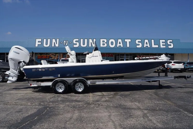 The Image of 2026 Skeeter SX241 boat on trailer at Fun-N-Sun Boat Sales dealership. - 0