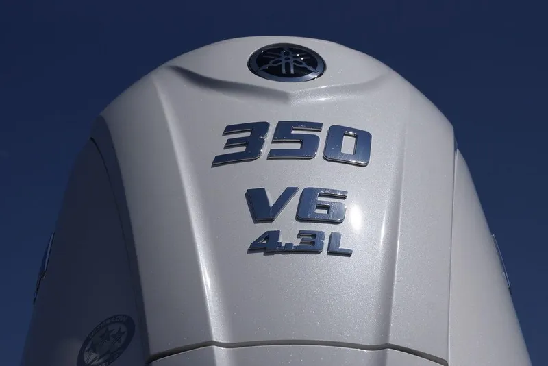 Slide: The Image of Close-up of 2026 Skeeter SX241 engine, 350 V6 4.3L, against clear sky. - 11