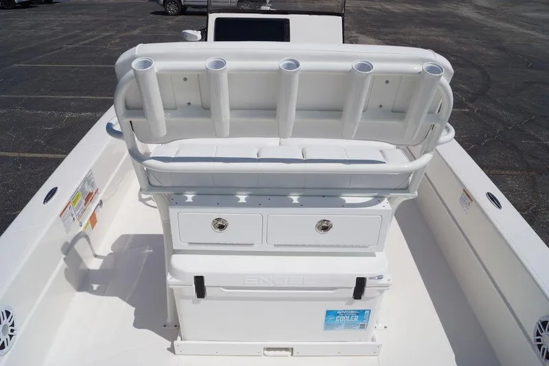 Slide: The Image of 2026 Skeeter SX241 boat interior with rod holders and storage compartments. - 13