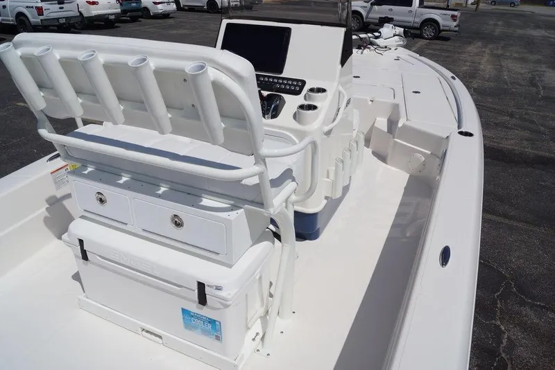 Slide: The Image of 2026 Skeeter SX241 boat interior with seating, console, and storage compartments. - 19