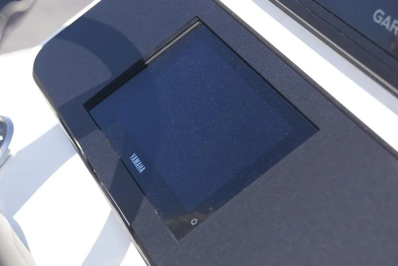 Slide: The Image of Yamaha display on 2026 Skeeter SX241 boat dashboard, close-up view. - 22