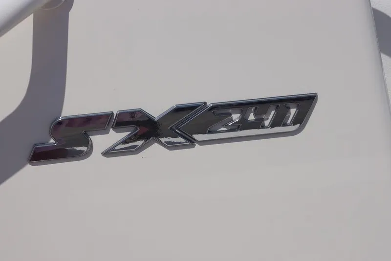 Slide: The Image of 2026 Skeeter SX241 logo on a white surface, showcasing sleek design. - 28
