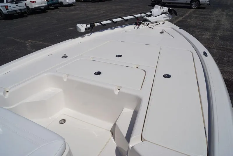 Slide: The Image of 2026 Skeeter SX241 boat deck with storage compartments and Garmin equipment. - 31