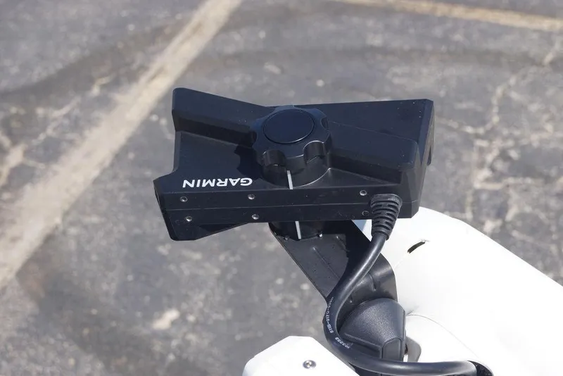 Slide: The Image of Garmin device mounted on a 2026 Skeeter SX241 boat, close-up view. - 35