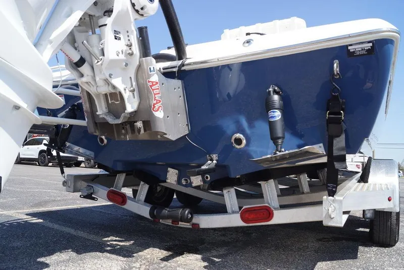 Slide: The Image of 2026 Skeeter SX241 boat on trailer, showcasing rear view and motor mount. - 4