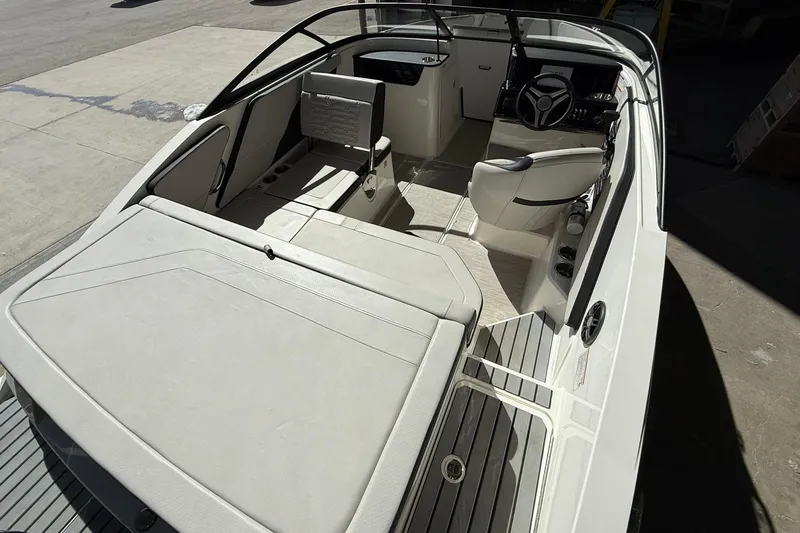Slide: The Image of 2025 Sea Ray 19 SPX OB boat interior with sleek seating and modern design. - 11