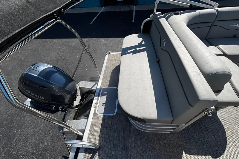 Slide: The Image of 2023 Bennington 188SLJ pontoon boat with Yamaha motor and gray seating. - 5