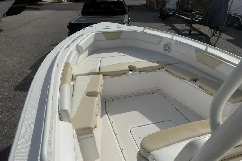 Slide: The Image of 2016 Everglades 243 Center Console boat with spacious seating and sleek design. - 20