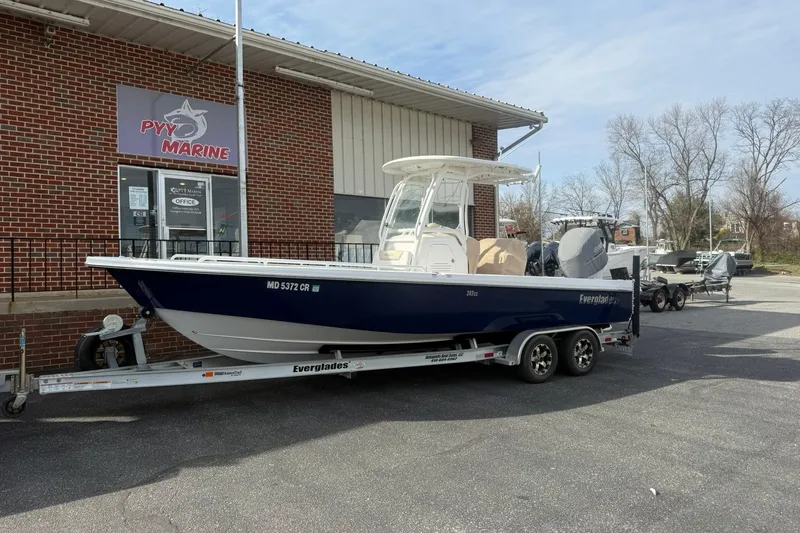 Slide: The Image of 2016 Everglades 243 Center Console boat on trailer outside PYY Marine building. - 33
