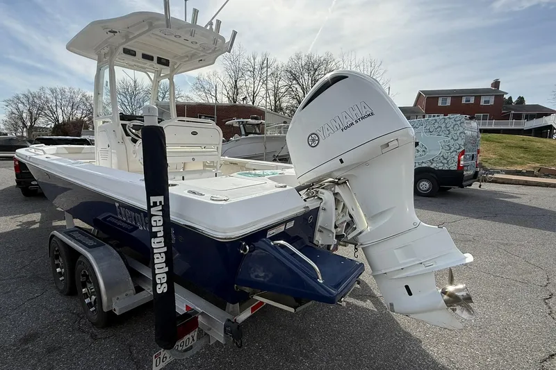 Slide: The Image of 2016 Everglades 243 Center Console boat with Yamaha engine on trailer. - 6