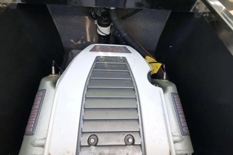 Slide: The Image of Engine compartment of 2012 MB B-52 23 Widebody boat, featuring a powerful motor. - 20