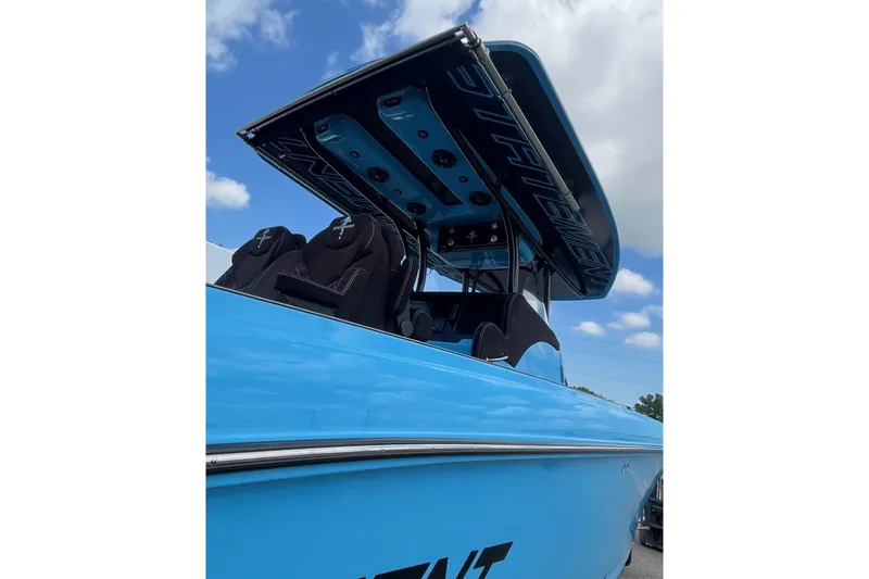 Slide: The Image of 2025 Statement 350 Open boat with sleek blue design and modern seating. - 10