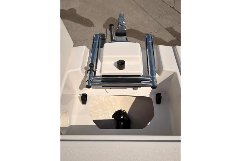 Slide: The Image of 2023 Stingray 201 DC boat seat with logo, featuring cup holders. - 17