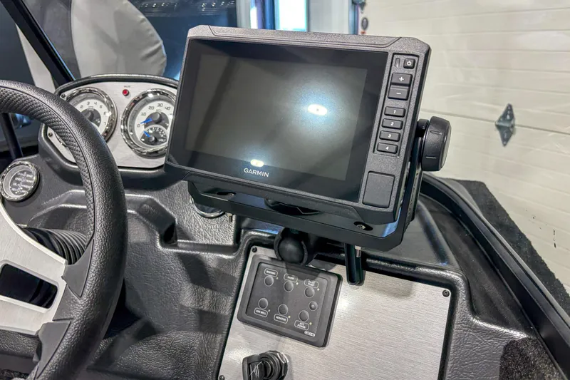 Slide: The Image of Dashboard of 2026 Smoker Craft Excursion 176 DC with Garmin display and gauges. - 13