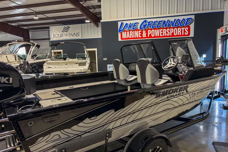 Slide: The Image of 2026 Smoker Craft Excursion 176 DC boat displayed at Lake Greenwood Marine & Powersports showroom. - 15