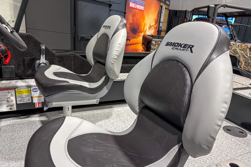 Slide: The Image of 2026 Smoker Craft Excursion 176 DC boat seats, featuring sleek black and gray design. - 7