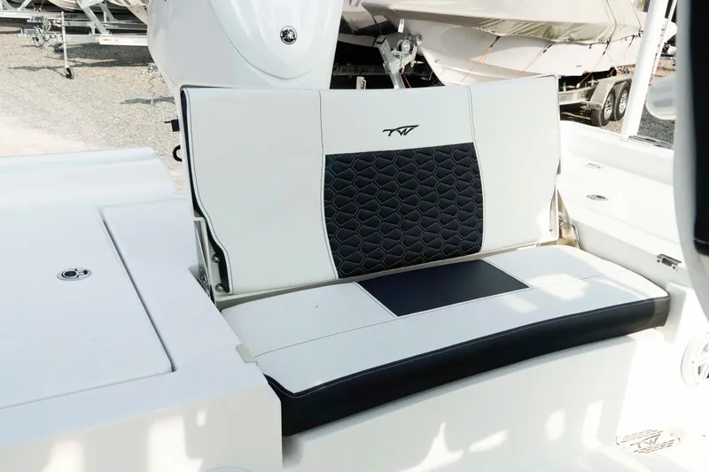 Slide: The Image of 2026 Tidewater 2300 Carolina Bay boat seat with stylish black and white upholstery. - 19