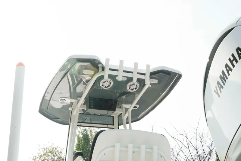Slide: The Image of Tidewater 2300 Carolina Bay 2026 boat with Yamaha engine, featuring sleek design and modern amenities. - 20