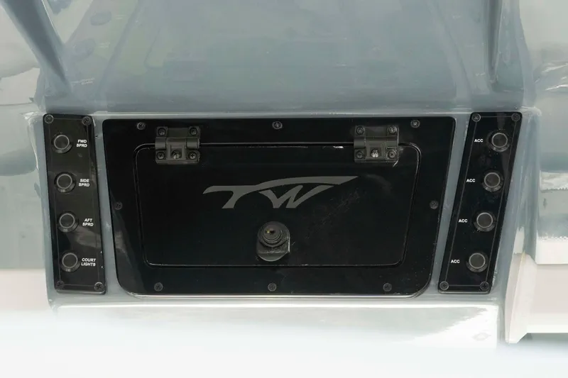 Slide: The Image of Control panel of 2026 Tidewater 2300 Carolina Bay boat with labeled switches. - 21