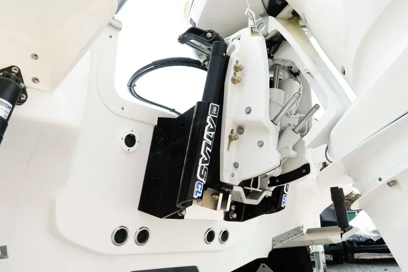 Slide: The Image of Close-up of 2026 Tidewater 2300 Carolina Bay boat engine and hydraulic system. - 27