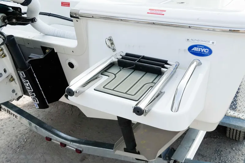 Slide: The Image of 2026 Tidewater 2300 Carolina Bay boat with swim platform and ladder. - 28