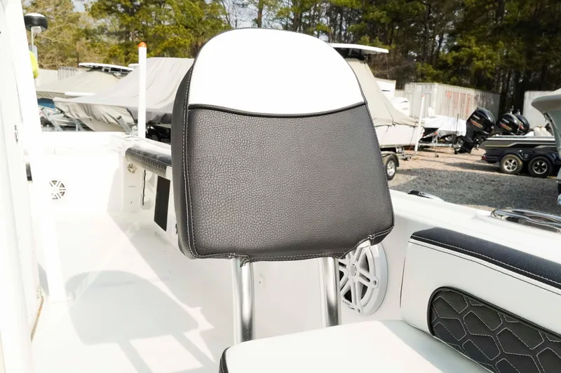 Slide: The Image of 2026 Tidewater 2300 Carolina Bay boat seat with black and white upholstery. - 32