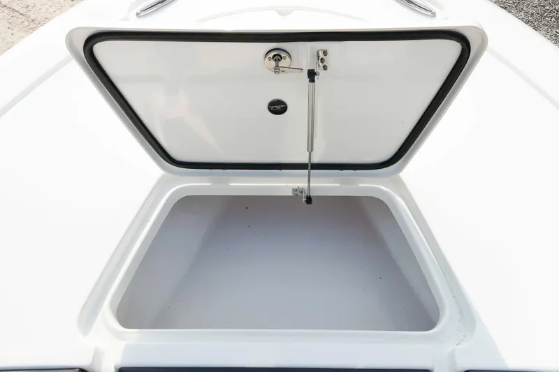 Slide: The Image of Open storage compartment on 2026 Tidewater 2300 Carolina Bay boat. - 36
