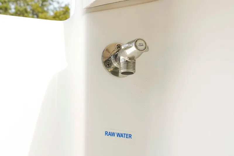 Slide: The Image of Raw water outlet on 2026 Tidewater 2300 Carolina Bay boat. - 39