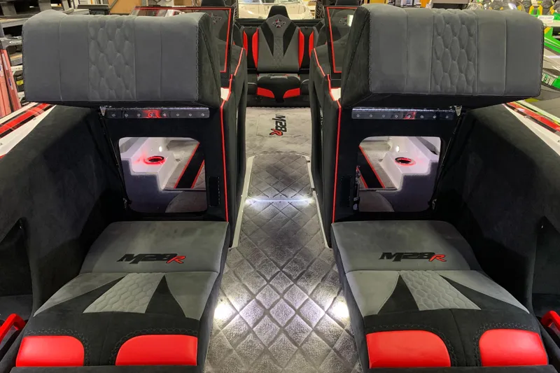 Slide: The Image of Interior of 2021 Daves Custom Boats M-28R with stylish seating and modern design. - 10