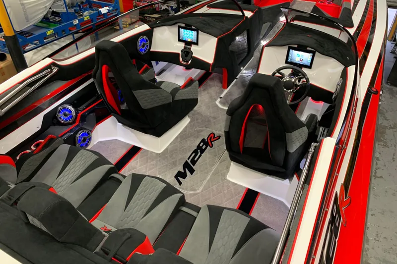 Slide: The Image of 2021 Daves Custom Boats M-28R interior with modern design and advanced technology features. - 13