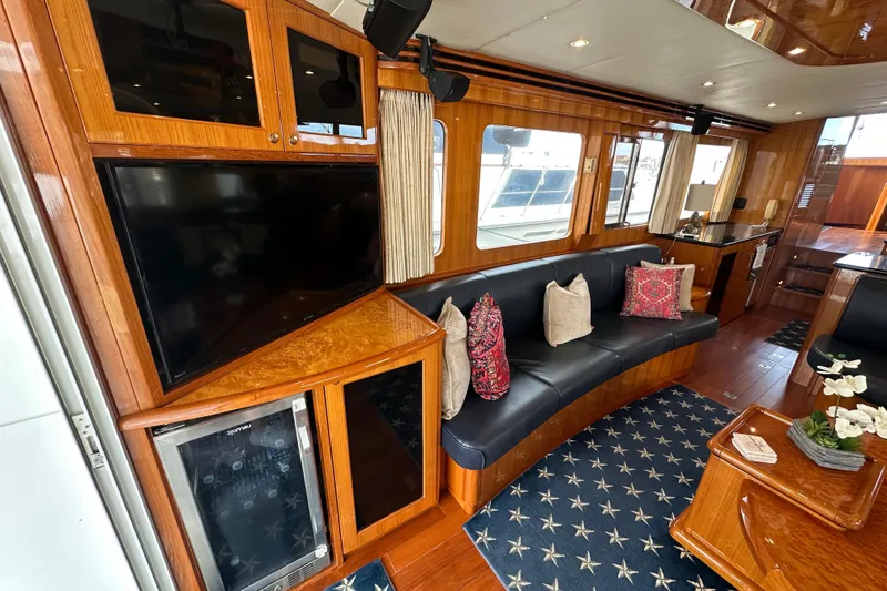 Slide: The Image of Luxurious interior of 2005 Jefferson Pilothouse 63 yacht with elegant wood finishes. - 14