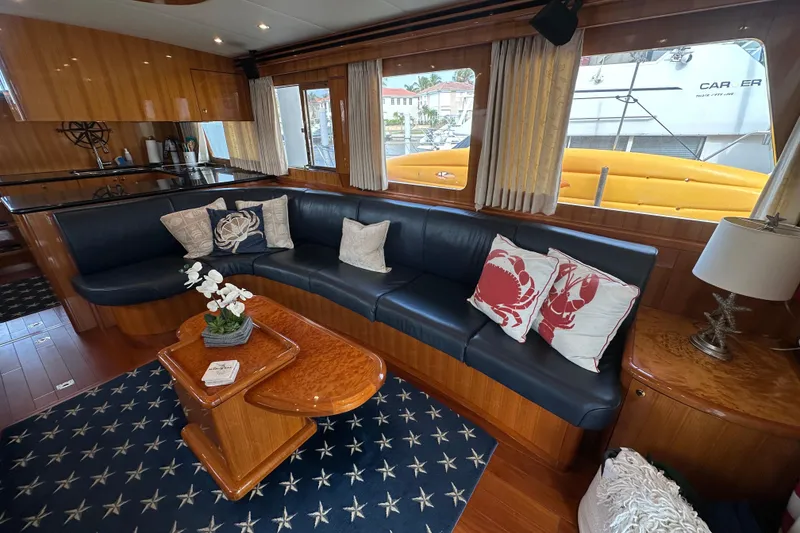 Slide: The Image of Luxurious interior of a 2005 Jefferson Pilothouse 63 yacht with elegant seating and nautical decor. - 15
