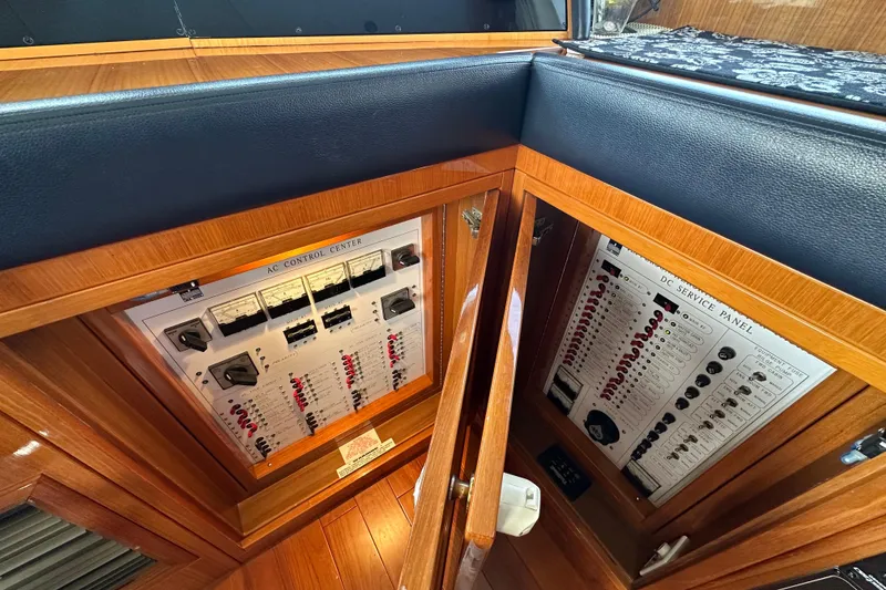 Slide: The Image of AC and DC control panels on a 2005 Jefferson Pilothouse 63 yacht. - 28