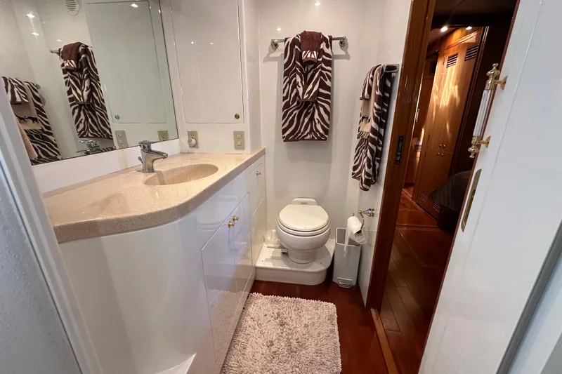 Slide: The Image of Luxurious bathroom in 2005 Jefferson Pilothouse 63 yacht with zebra-patterned towels. - 37