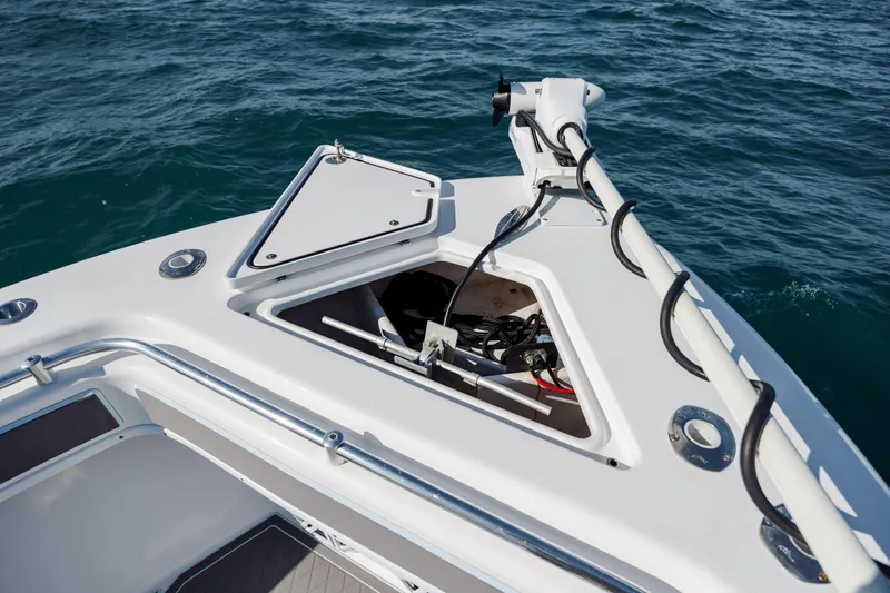 Slide: The Image of 2024 Contender 28 Tournament boat bow with open hatch, showing anchor storage. - 12