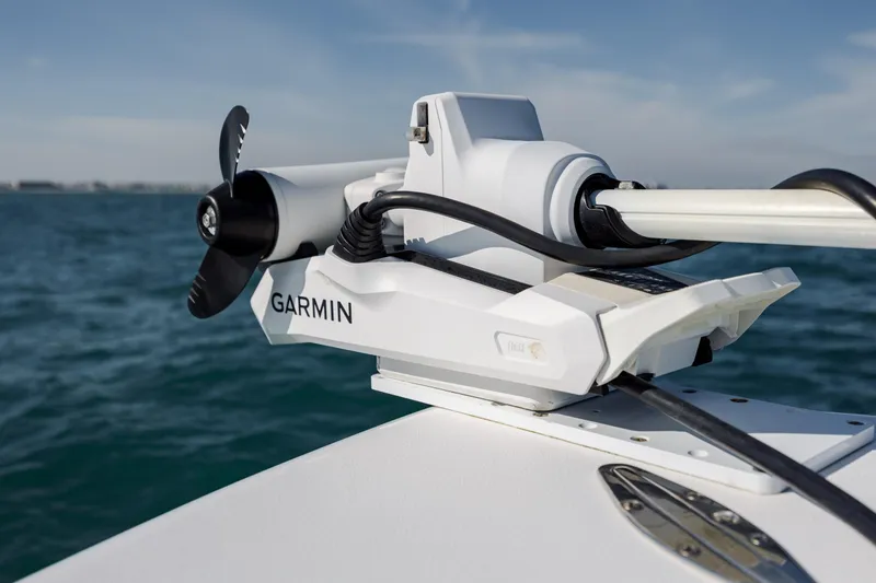 Slide: The Image of Garmin trolling motor on 2024 Contender 28 Tournament boat, ocean background. - 13