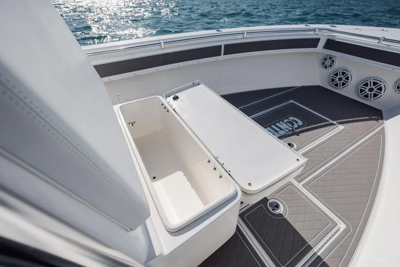 Slide: The Image of 2024 Contender 28 Tournament boat deck with storage compartments and speakers. - 19