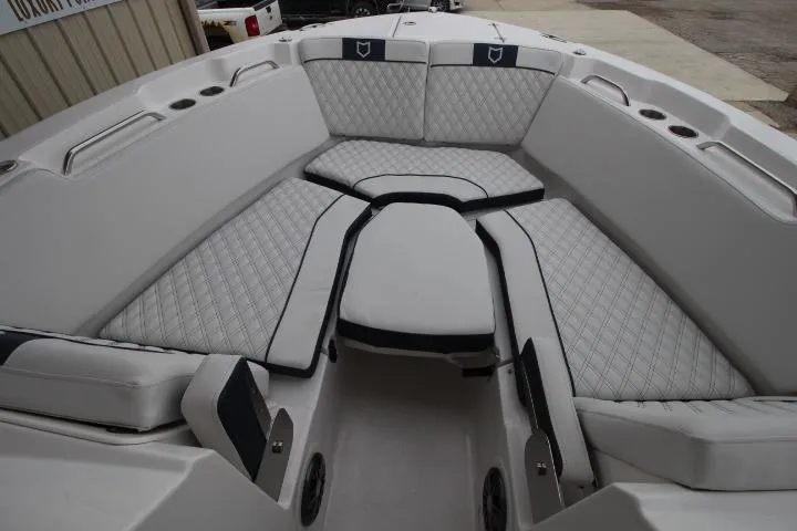 Slide: The Image of 2026 Sea Fox 268 Traveler boat interior with luxurious seating and diamond-pattern upholstery. - 11
