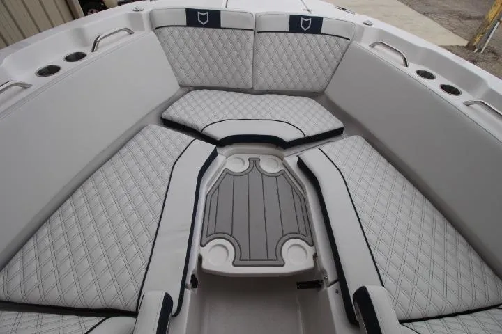 Slide: The Image of Luxurious seating area on 2026 Sea Fox 268 Traveler boat with diamond-stitched upholstery. - 12