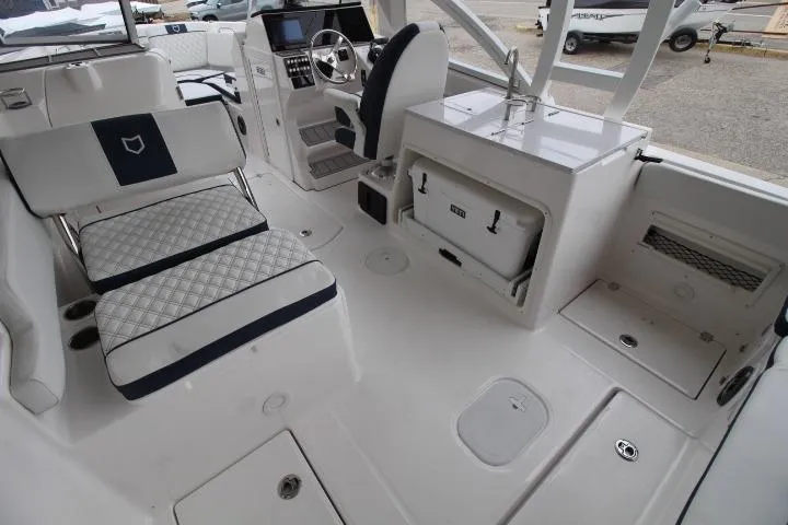 Slide: The Image of Interior of 2026 Sea Fox 268 Traveler boat, featuring seating and helm area. - 7