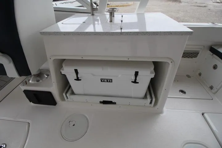 Slide: The Image of Sea Fox 268 Traveler 2026 boat with Yeti cooler storage compartment. - 8