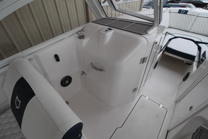 Slide: The Image of 2026 Sea Fox 268 Traveler boat interior with seating and storage compartments. - 9