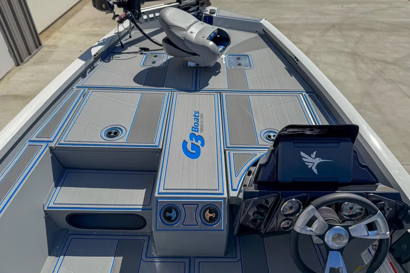 Slide: The Image of 2026 G3 Sportsman 1810 SE boat interior with modern dashboard and seating. - 10