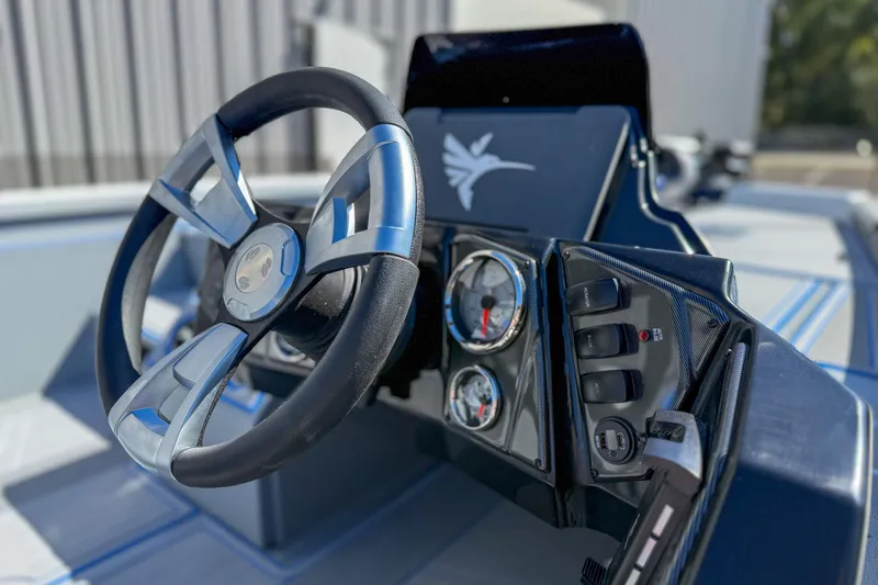 Slide: The Image of 2026 G3 Sportsman 1810 SE boat dashboard with steering wheel and gauges. - 5