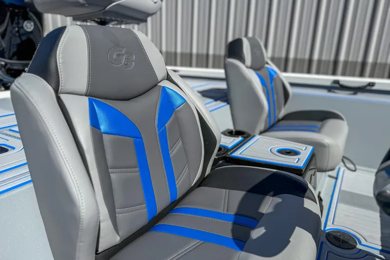 Slide: The Image of 2026 G3 Sportsman 1810 SE boat seats with blue and gray design. - 6